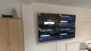 4 LG TVs Mounted in a grid formation
