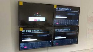 4 TVs mounted in a grid fashion
